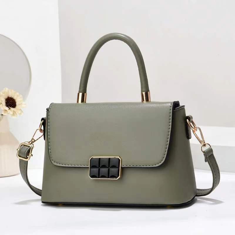 Macaron-colored handbag with a shoulder strap